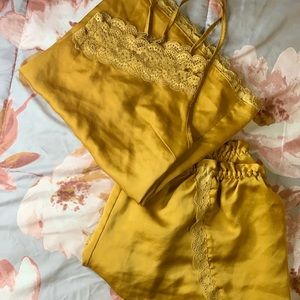 A satin gold bed or lounge wear